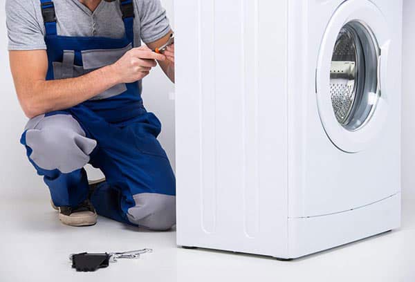 Tháo vỏ sau của máy giặt